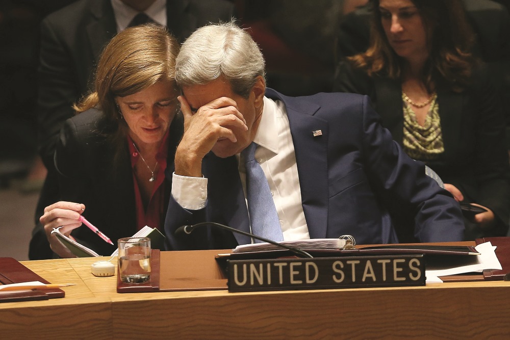 Secretary of State John Kerry speaks with United States Ambassador to the United Nations Samantha Power at a UN Security Council meeting on counter terrorism on September 30, 2015.  SPENCER PLATT / Getty Images / AFP
