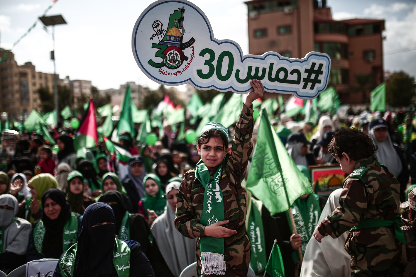 Palestinians marking the 30th anniversary of Hamas, in al-Katiba Square, Gaza City, December 14, 2017.  MUSTAFA HASSONA / AA Photo