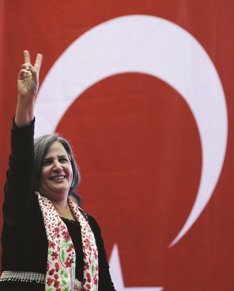 Gulten Kisanak, chairman of the pro-Kurdish Peace and Democracy Party gestures as she attends the party’s congress in Ankara. AFP / Adem Altan